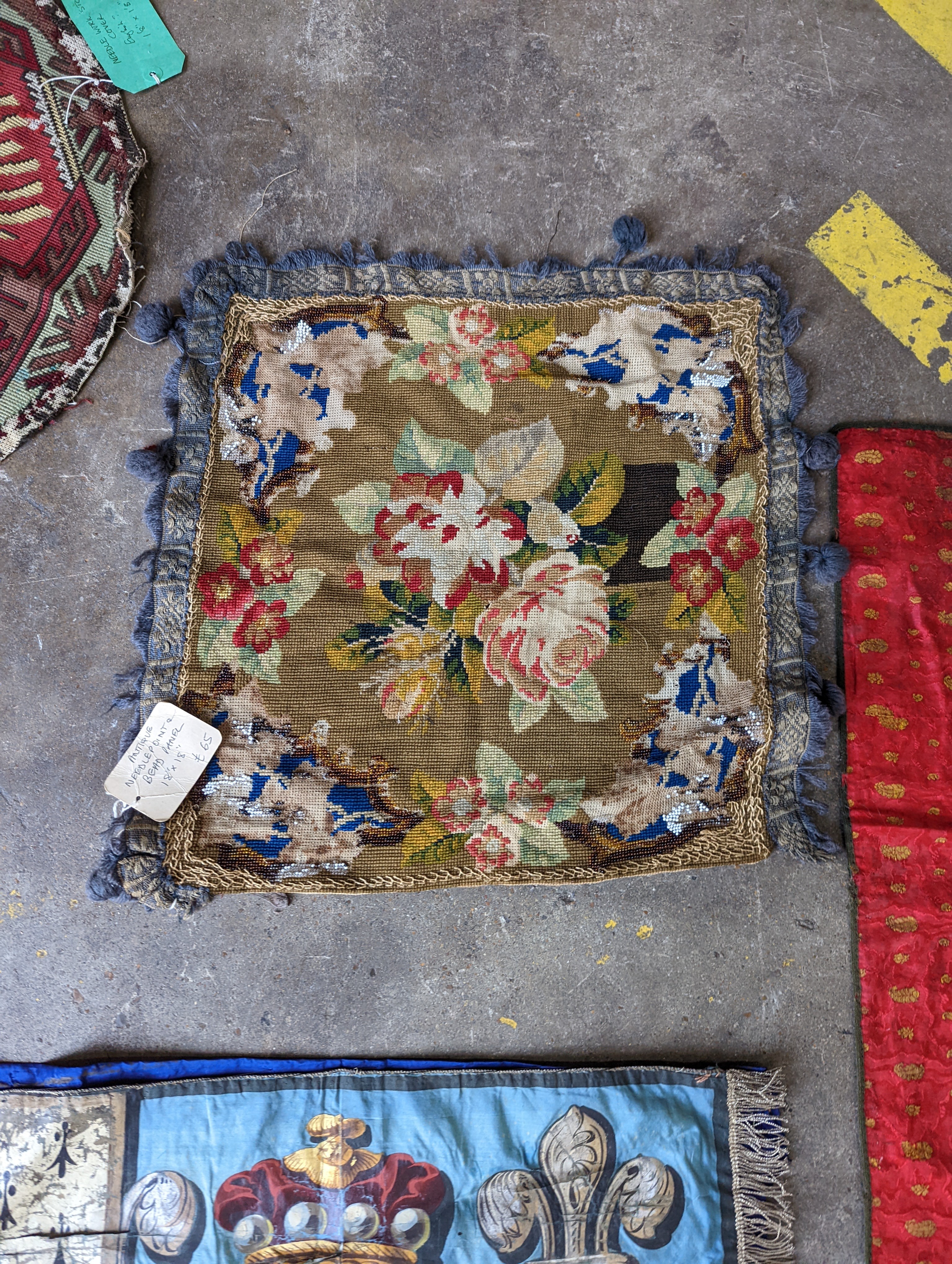 An Ottoman silk Koran cloth, three needle and bead work covers and assorted textiles